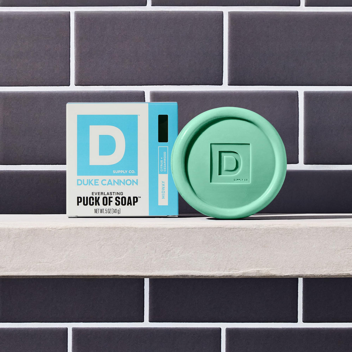 Duke Cannon soap puck with citrus and sandalwood ingredients