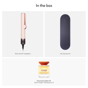 Dyson Airstrait™ Straightener and Omega™ Hair Oil set on heat-resistant mat