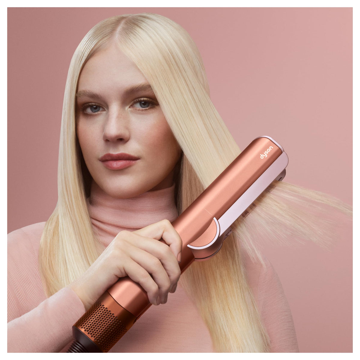 Dyson Airstrait™ Straightener in use on wet hair