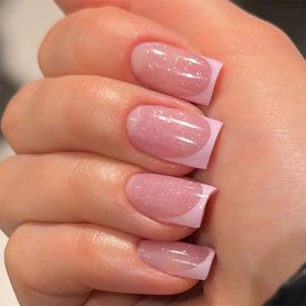 DZPGUONIZ Pink Press On Nails Medium French Tip set in packaging