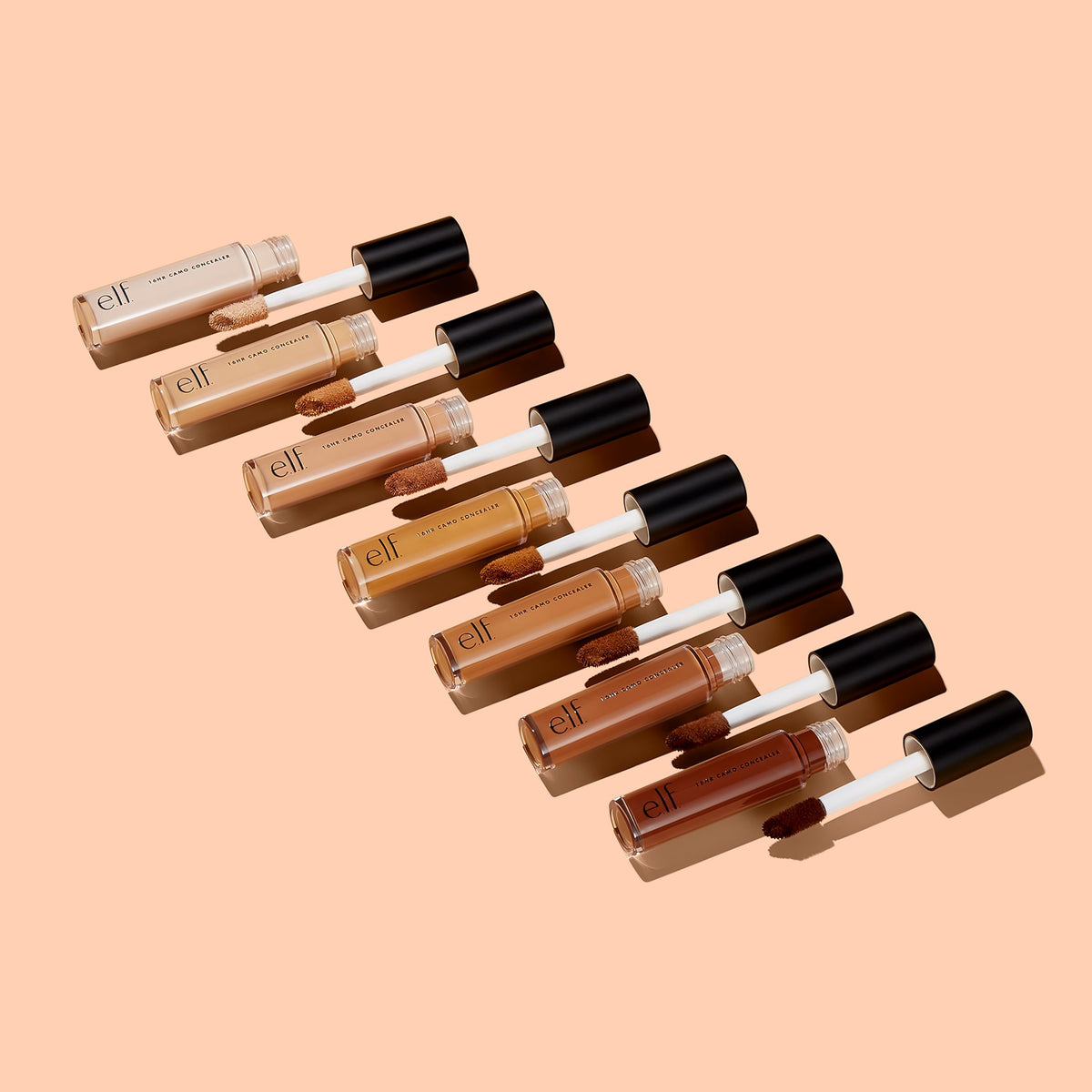 e.l.f. 16HR Camo Concealer Deep Cinnamon with makeup tools
