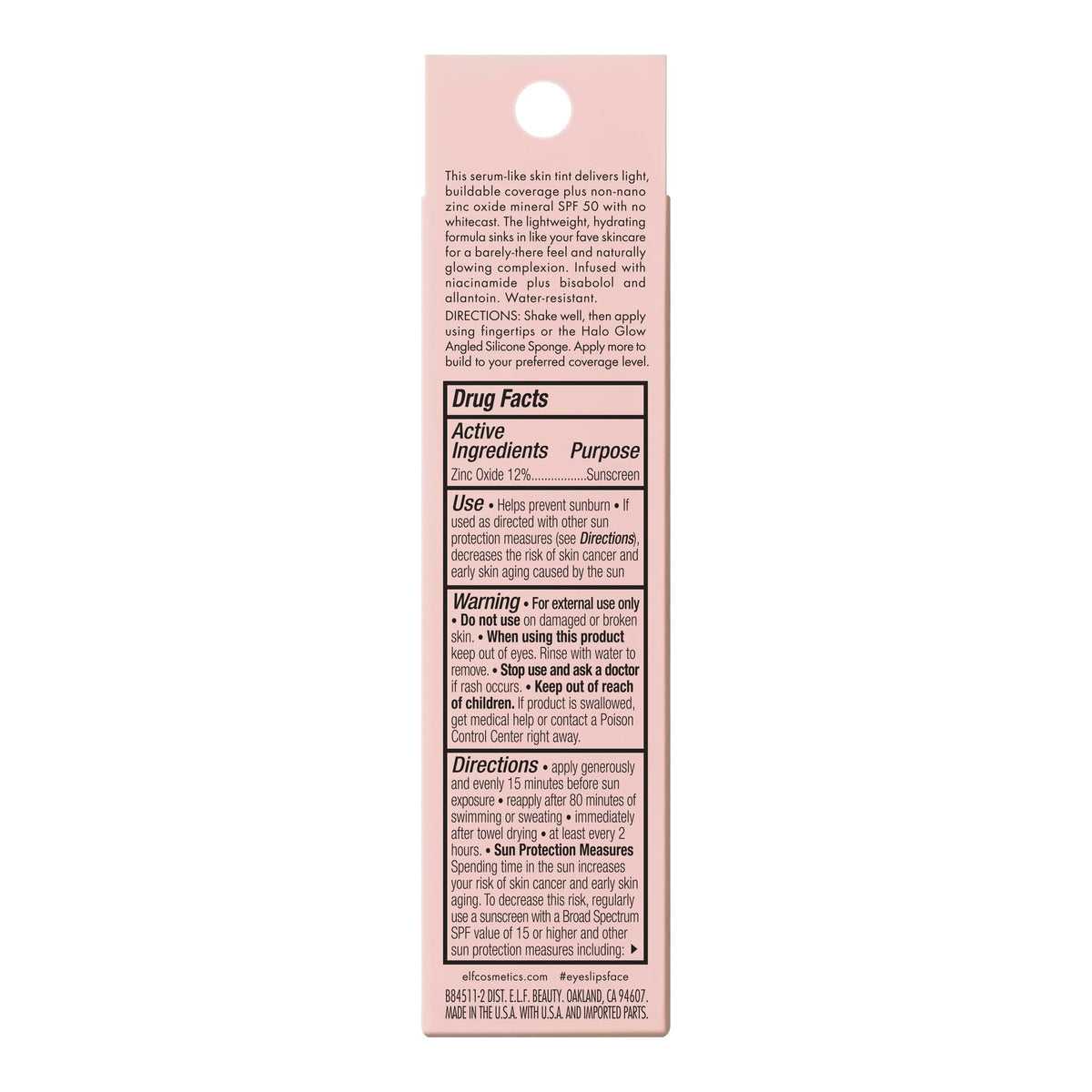 e.l.f. Halo Glow Skin Tint SPF 50 on vanity with makeup tools