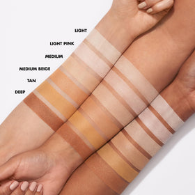 e.l.f. Halo Glow Soft Focus Setting Powder on a makeup table