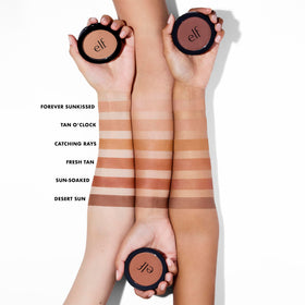 e.l.f. Primer-Infused Bronzer Tan O'Clock with blending brush
