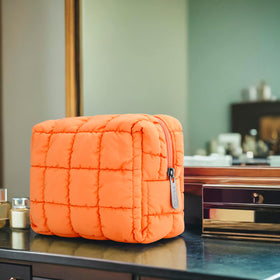 E-Tree Cute Makeup Bag in hand showing size and portability