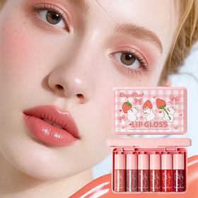 Eakroo lip gloss in nude pink shade close-up