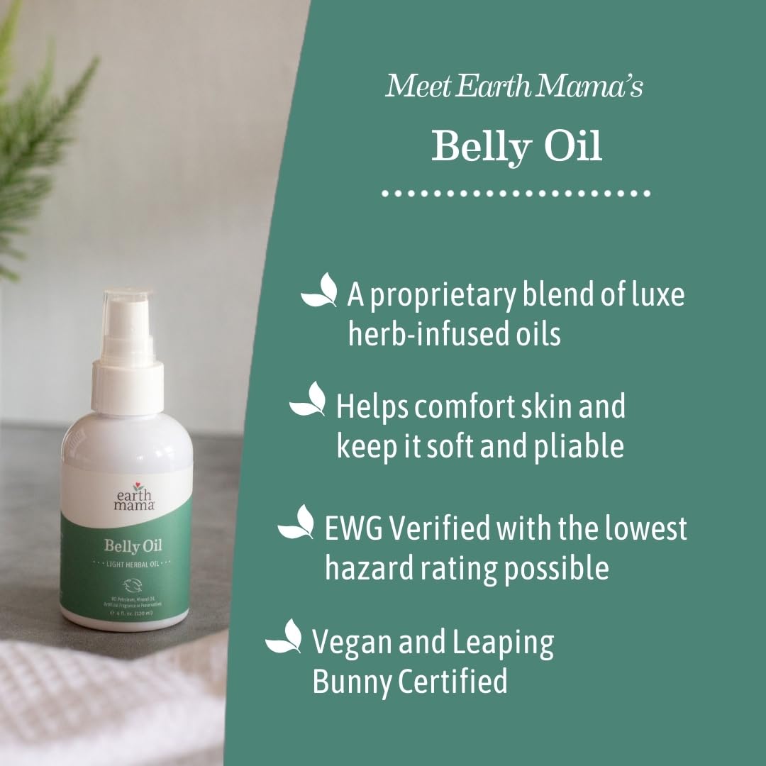 Earth Mama Belly Oil 4oz with hands applying oil