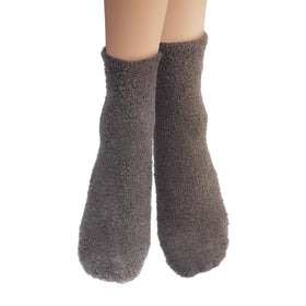 Earth Therapeutics Aloe Socks in use during a relaxing home spa