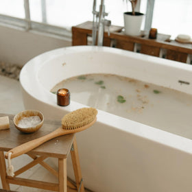 Earthborn Elements Lavender Epsom Salt pouring into water