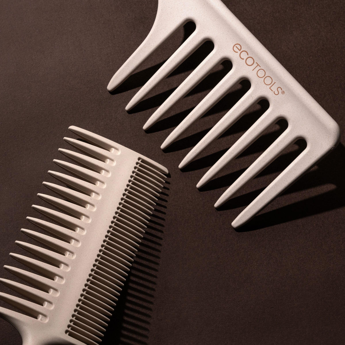 EcoTools Double-Sided Hair Comb in use on curly hair