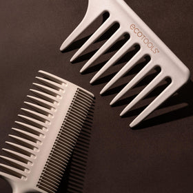 EcoTools Double-Sided Hair Comb in use on curly hair