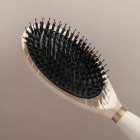 EcoTools Dual Bristle Hair Brush back view highlighting the bristle design