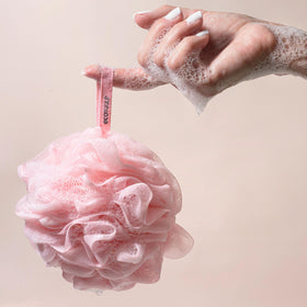 EcoTools EcoPouf bath sponge in use with body wash