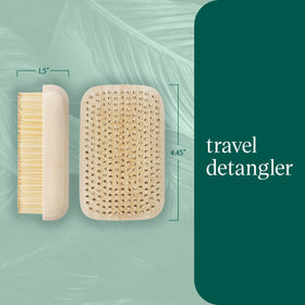 EcoTools Travel Detangler Hairbrush being used on wet hair