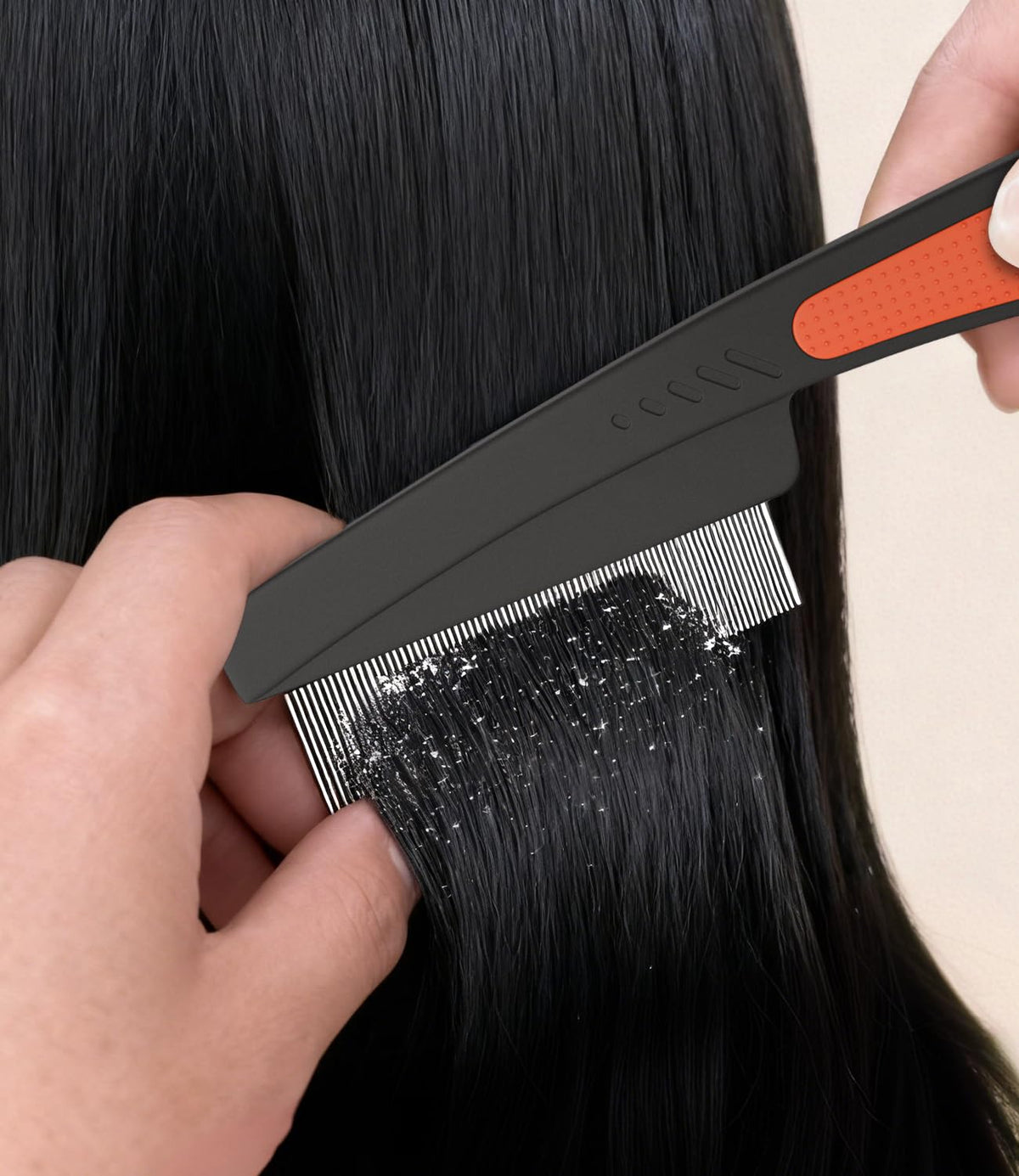 EHBELIF comb showing one-button debris ejection feature