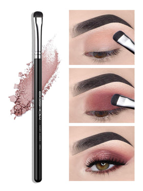 EIGSHOW Angled Eyeliner Brush in hand for precision application