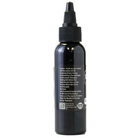 Element Tattoo Supply Nighthawk Black Ink 2oz with tattoo art background