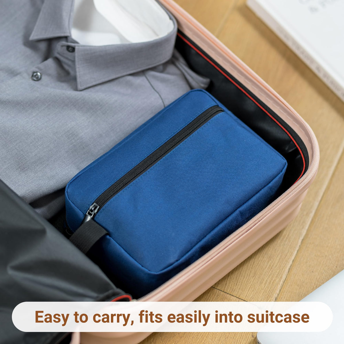 Elviros Travel Toiletry Bag displayed with travel accessories