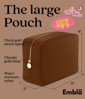 Embla Large Makeup Bag open with cosmetics inside
