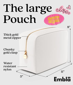 Embla Large Makeup Bag opened displaying cosmetics