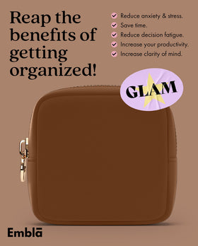 Embla Makeup Bag Chocolate compact size in a backpack