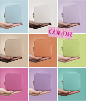 Embla Makeup Bag Chocolate with feminine hygiene products inside