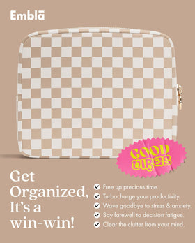 Embla Makeup Bag in use as a clutch handbag