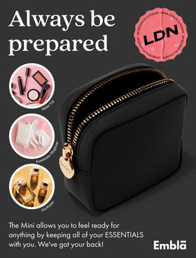 Embla Small Makeup Bag in black lifestyle scene on a vanity