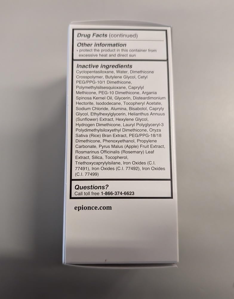 Epionce Daily Shield Tinted SPF 50 next to skincare products