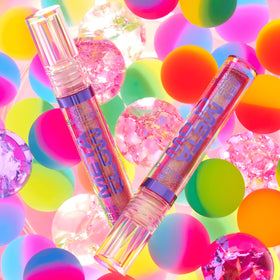 Essence Meta Glow Lip Gloss 03 Pink Vision displayed on vanity
