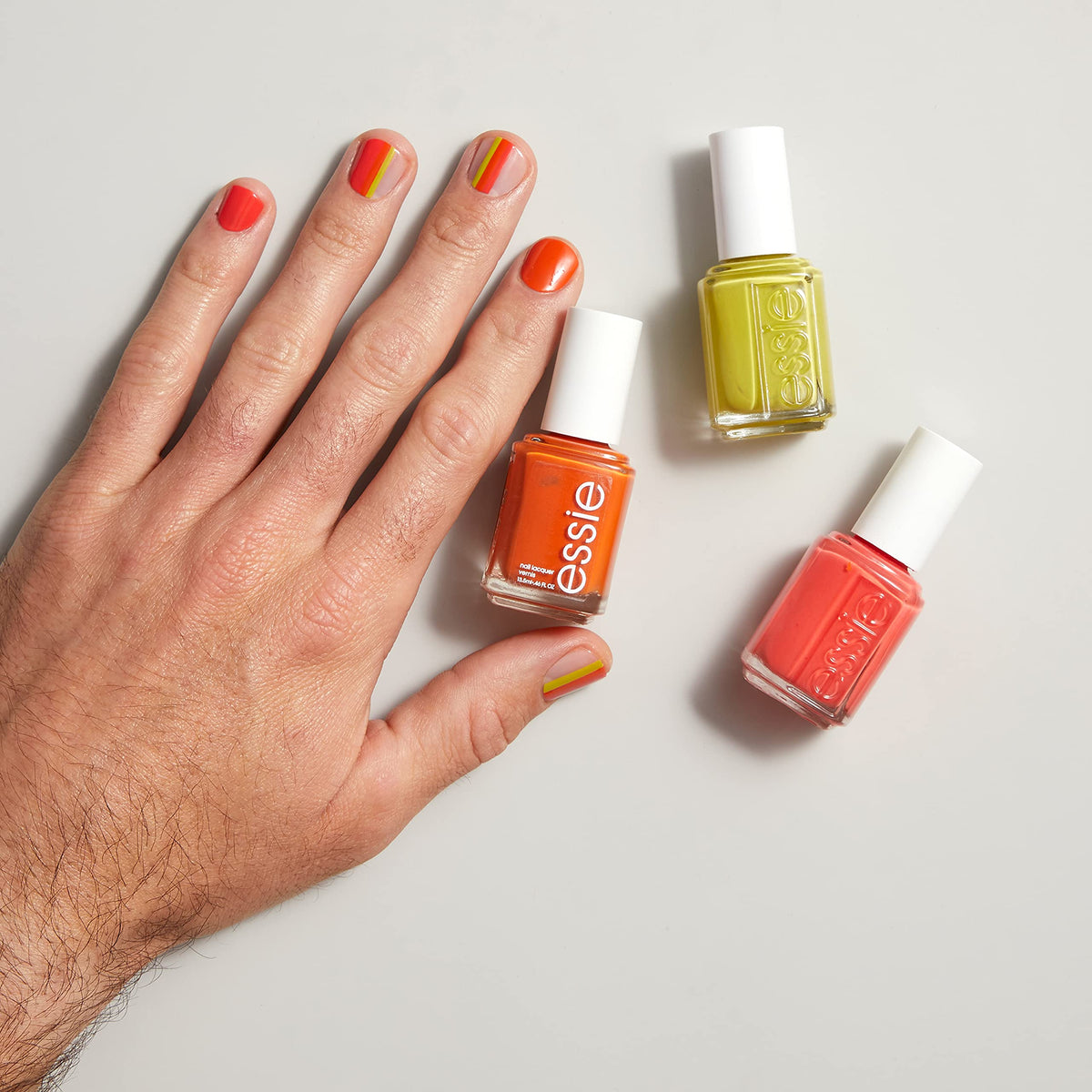 essie To DIY For Pumpkin Orange Nail Polish lifestyle scene