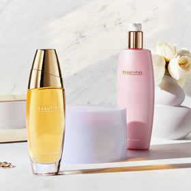 Estée Lauder Beautiful Eau de Parfum with floral background
