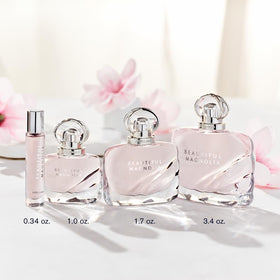 Estée Lauder Beautiful Magnolia Eau de Parfum with floral background