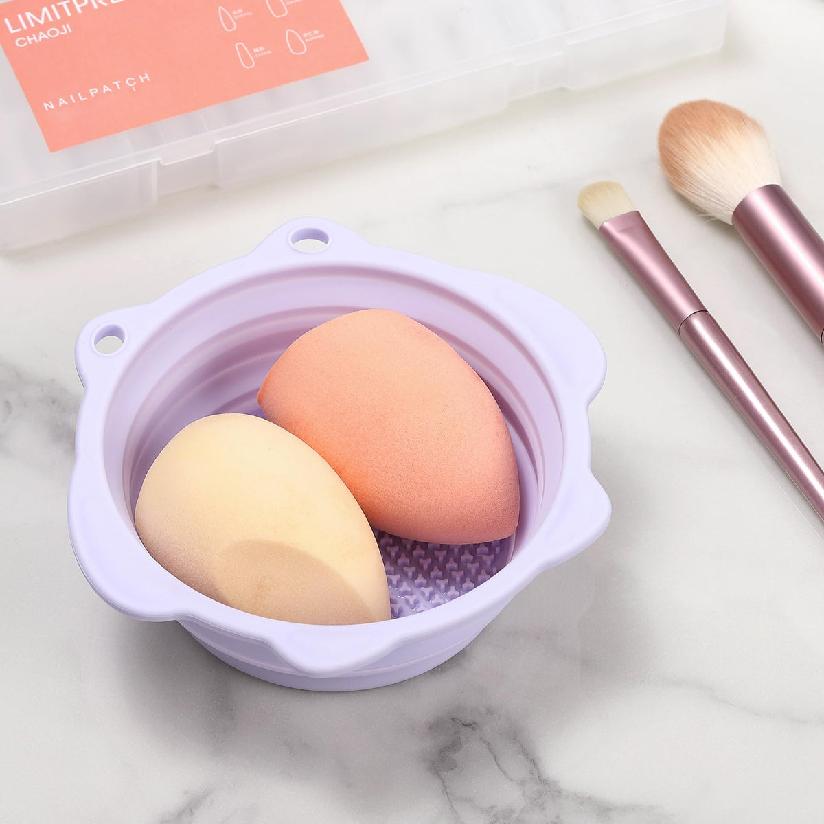 Etercycle Foldable Silicone Makeup Brush Cleaner Bowl in use with brush
