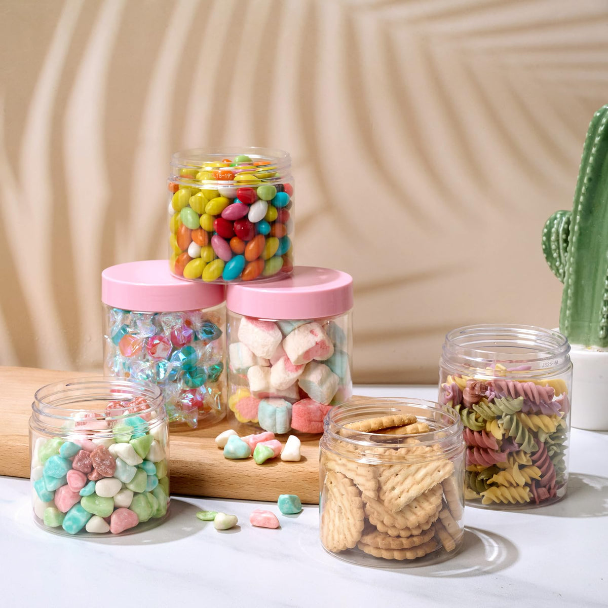 Eternal Moment jars with labels and spatulas on a table