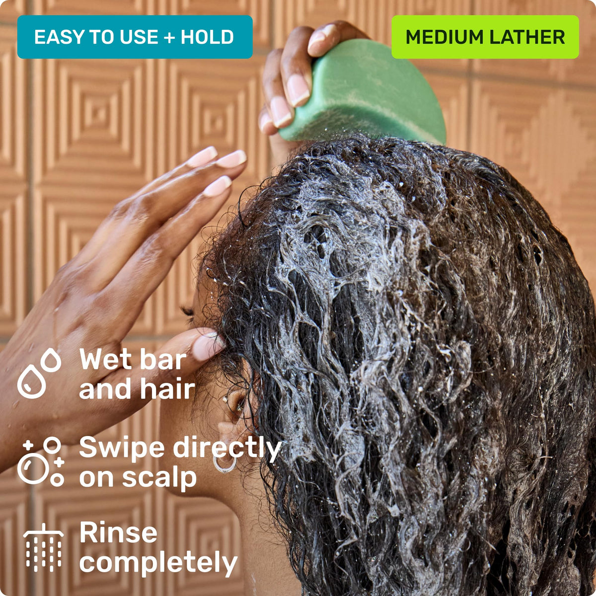 Ethique Curl-Defining Shampoo Bar on a wooden surface