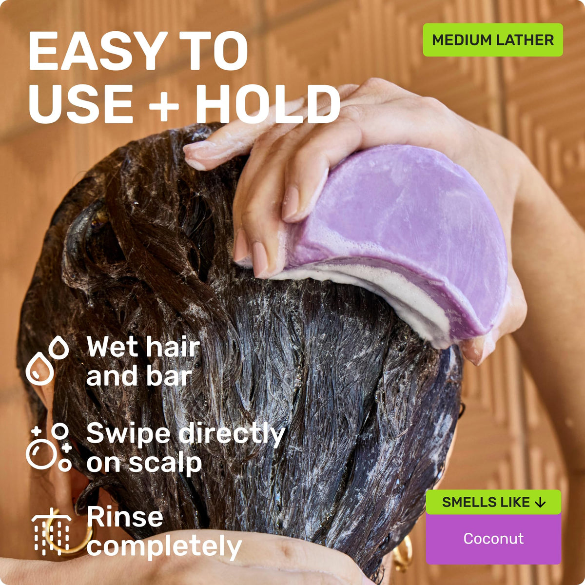 Ethique Smoothing Shampoo Bar on a bathroom shelf