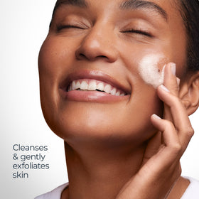Eucerin Radiant Tone Cleansing Gel 2% AHA with fresh flowers