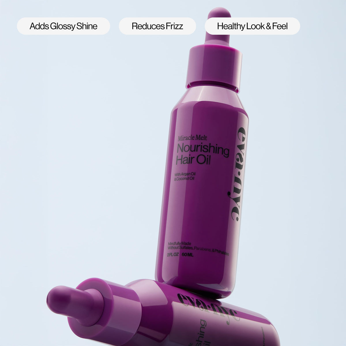 EVA·NYC Quick Absorbing Hair & Body Oil lifestyle scene on vanity