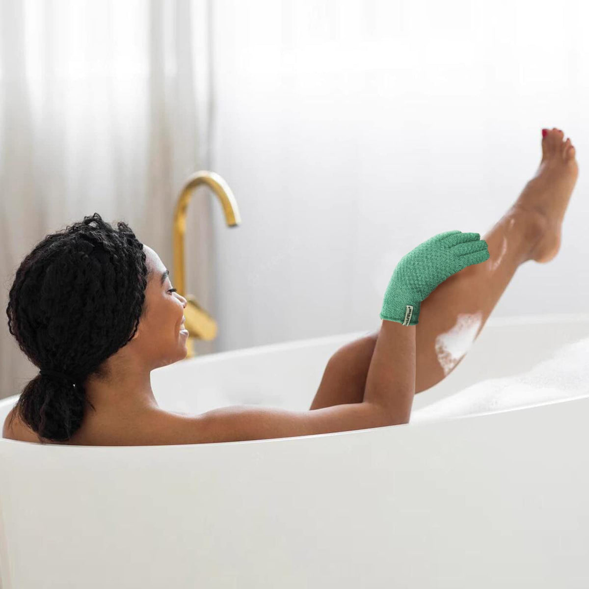 Evridwear Exfoliating Bath Gloves laid flat on a bathroom counter