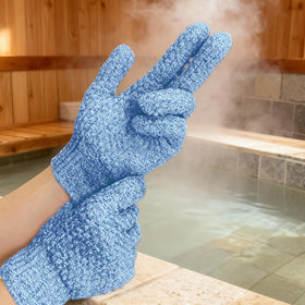 Evridwear Exfoliating Gloves on a bathroom shelf