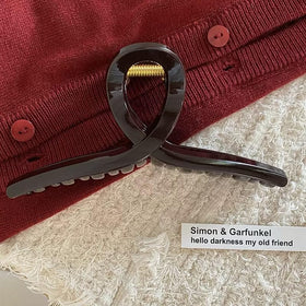 FAELBATY Big Butterfly Hair Claw Clips in use outdoors