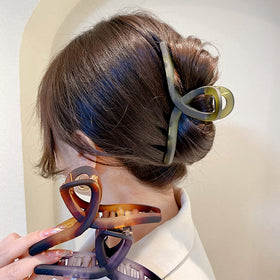 FAELBATY Large Hair Claw Clips displayed on a vanity