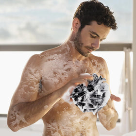 Farmoga Bath Loofah Sponge demonstrating rich lather with soap