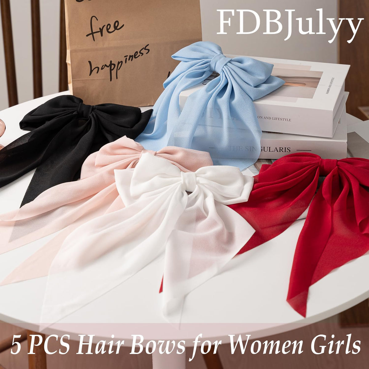 FDBJulyy hair bows displayed on a table