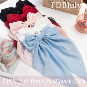 FDBJulyy hair clips in use during makeup application