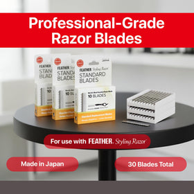 Feather styling razor with replacement blades attached