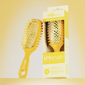 FHI Heat UNbrush Curl Detangling Brush in a lifestyle setting