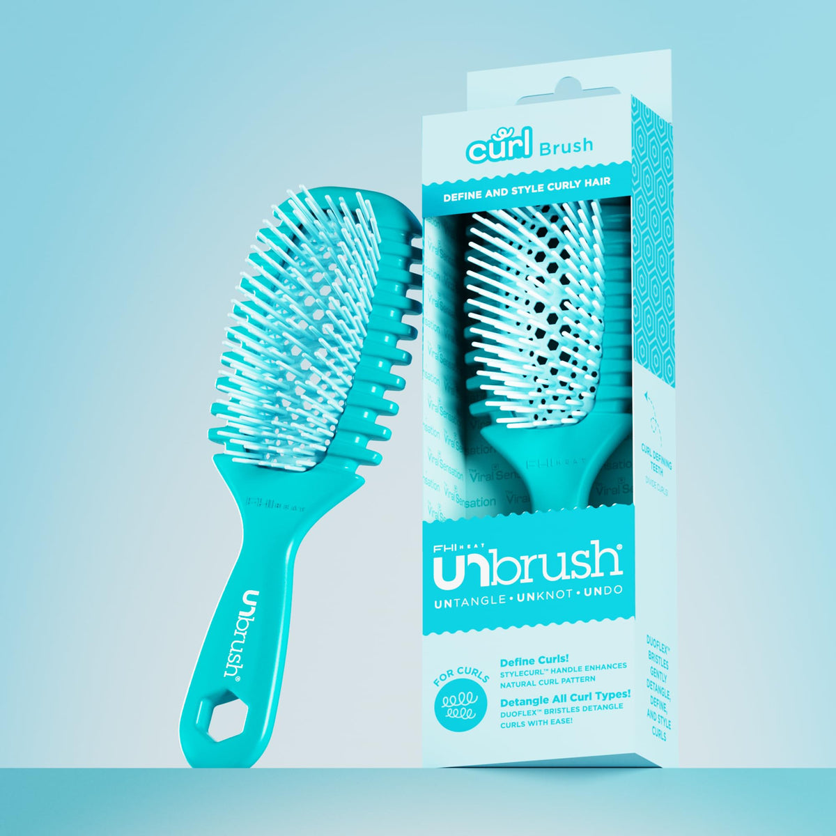 FHI Heat UNbrush Curl Detangling Brush in use on wet hair