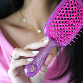 FHI Heat UNbrush Detangling Brush displayed with packaging